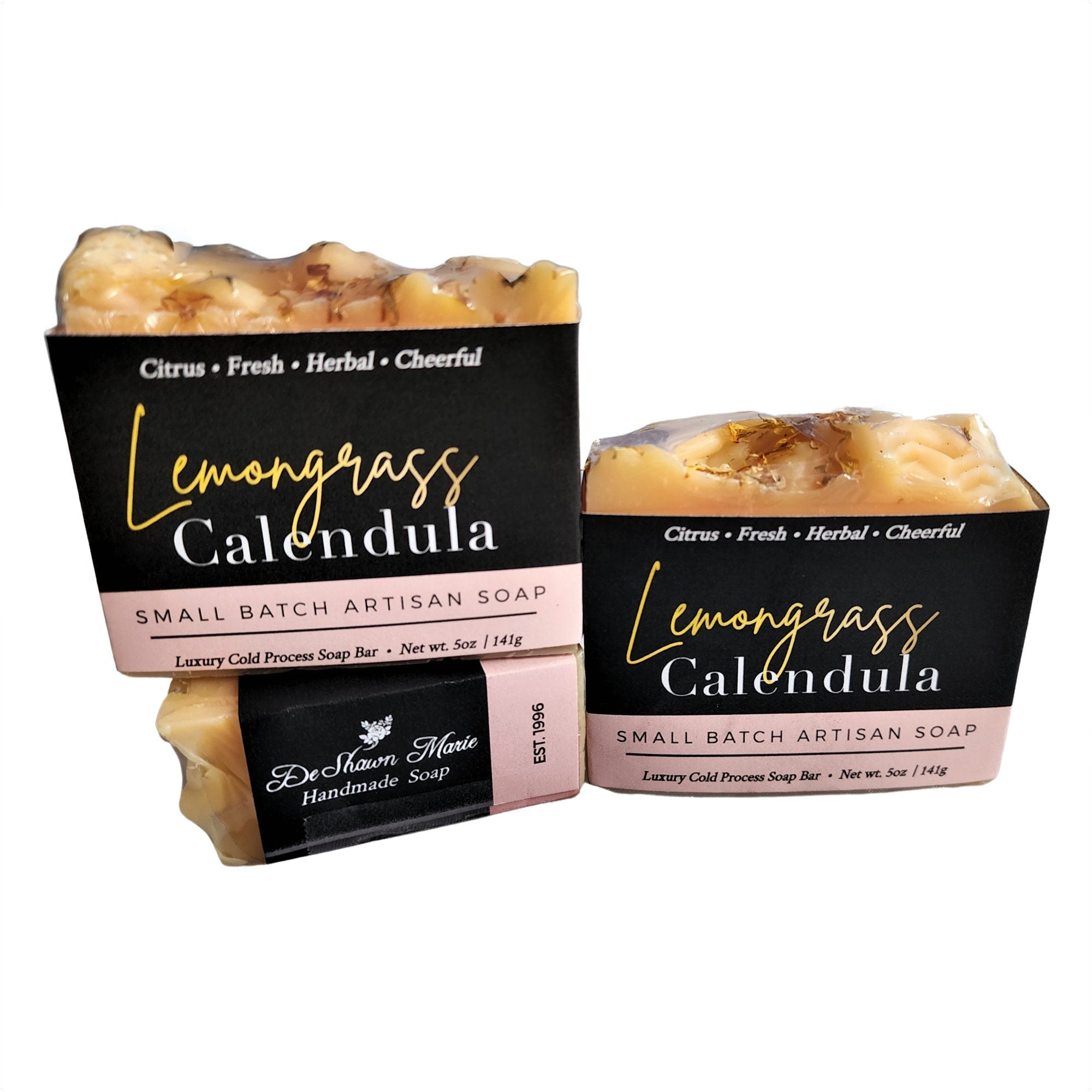 Lemongrass Calendula Soap bar topped with calendula petals, showcasing its vibrant colors and natural ingredients.