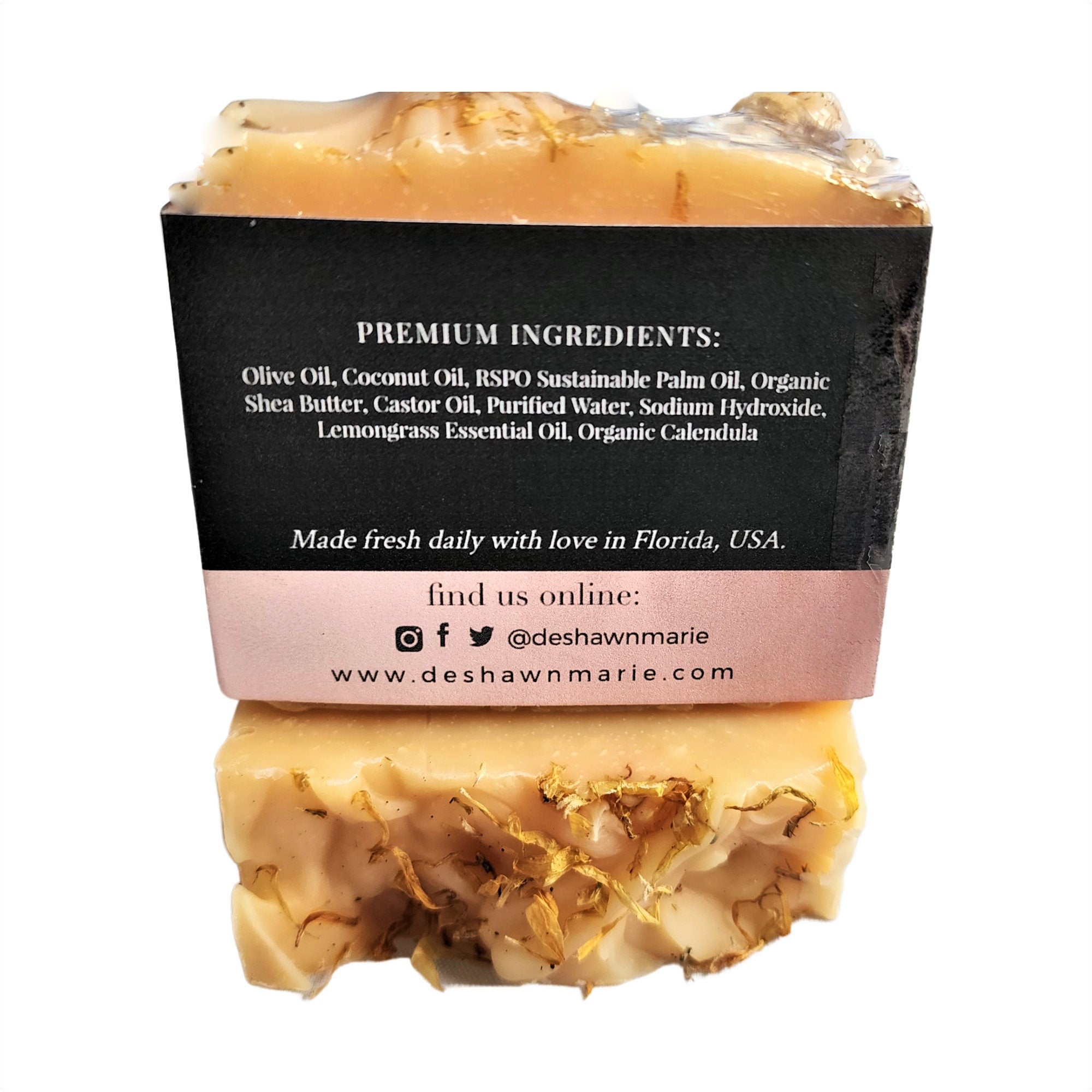 Lemongrass Calendula Soap bar topped with calendula petals, showcasing its vibrant colors and natural ingredients.