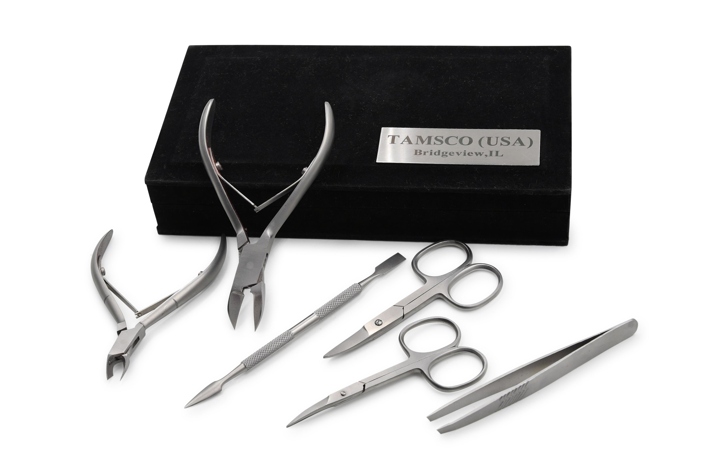 Professional Grade Manicure/Pedicure Kit with six stainless steel tools in a felt-lined gift box.