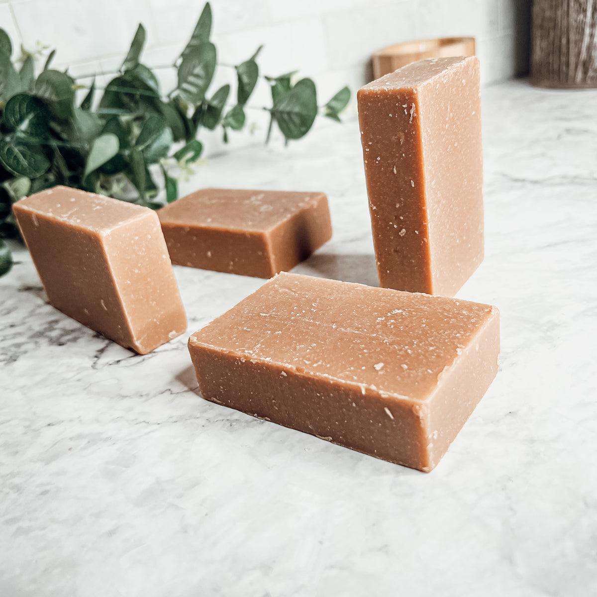 A bar of Nag Champa & Clay soap showcasing its earthy color and texture, with a hint of natural fragrance.