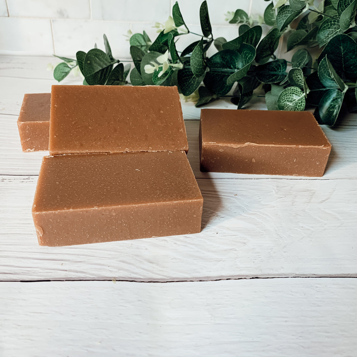 A bar of Nag Champa & Clay soap showcasing its earthy color and texture, with a hint of natural fragrance.