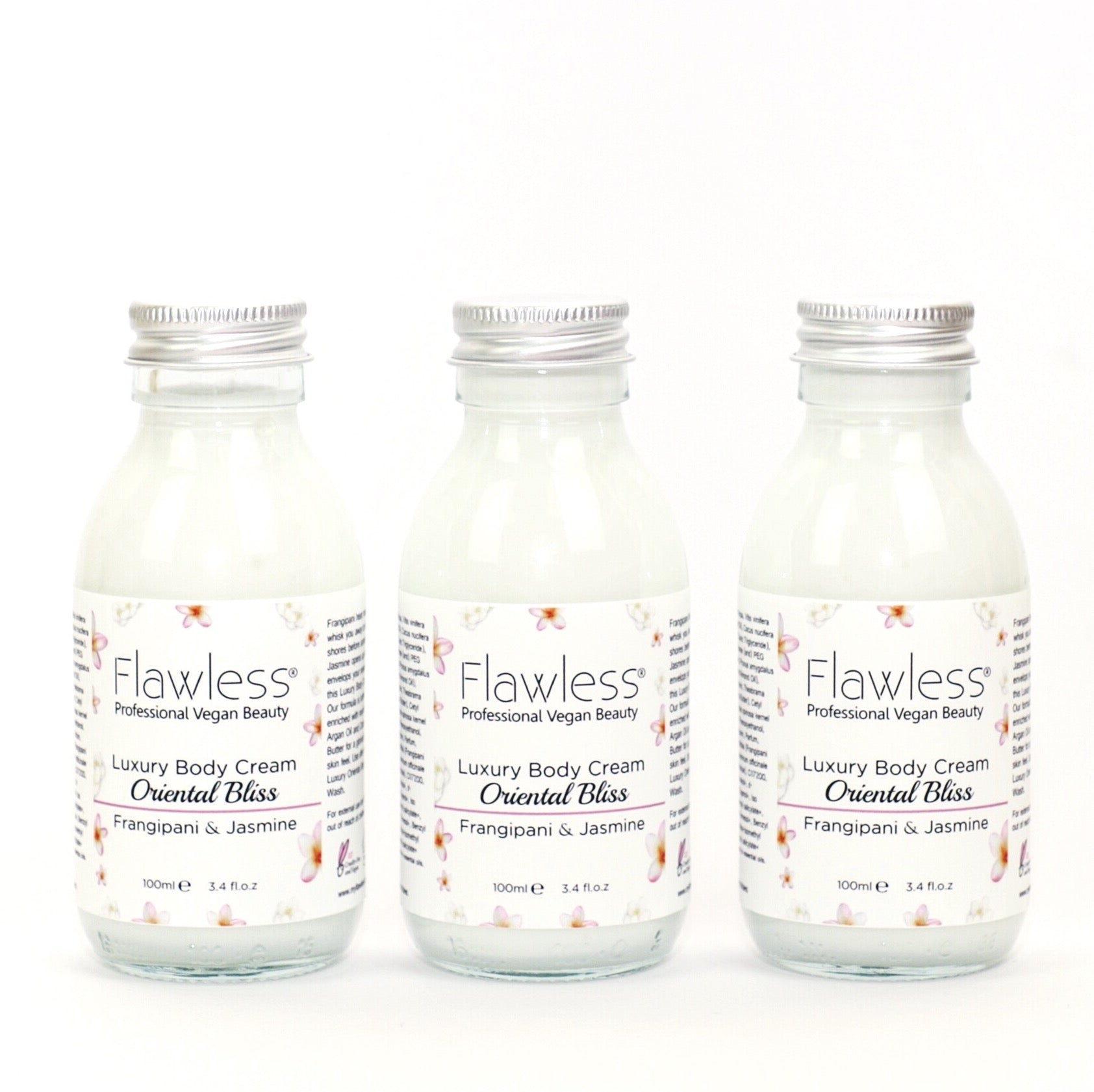 Oriental Bliss Nourishing Body Cream in a recycled glass jar with an aluminum lid, showcasing its eco-friendly packaging and creamy texture.