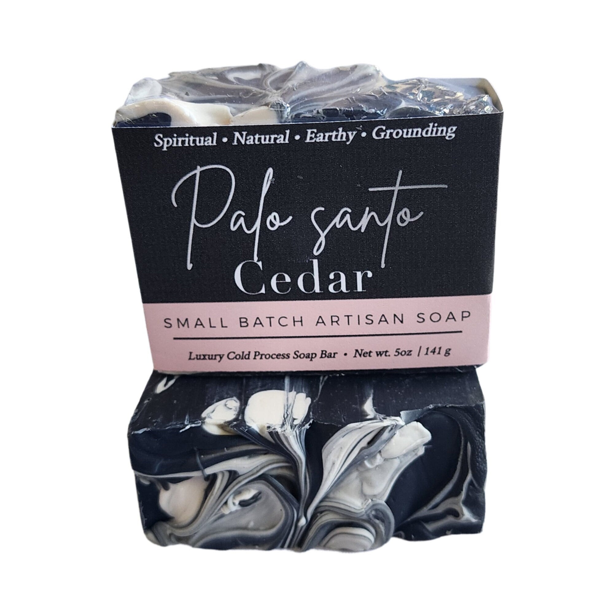 Palo Santo Cedar Soap bar with earthy and woodsy scents, handcrafted and wrapped, showcasing its unique design.