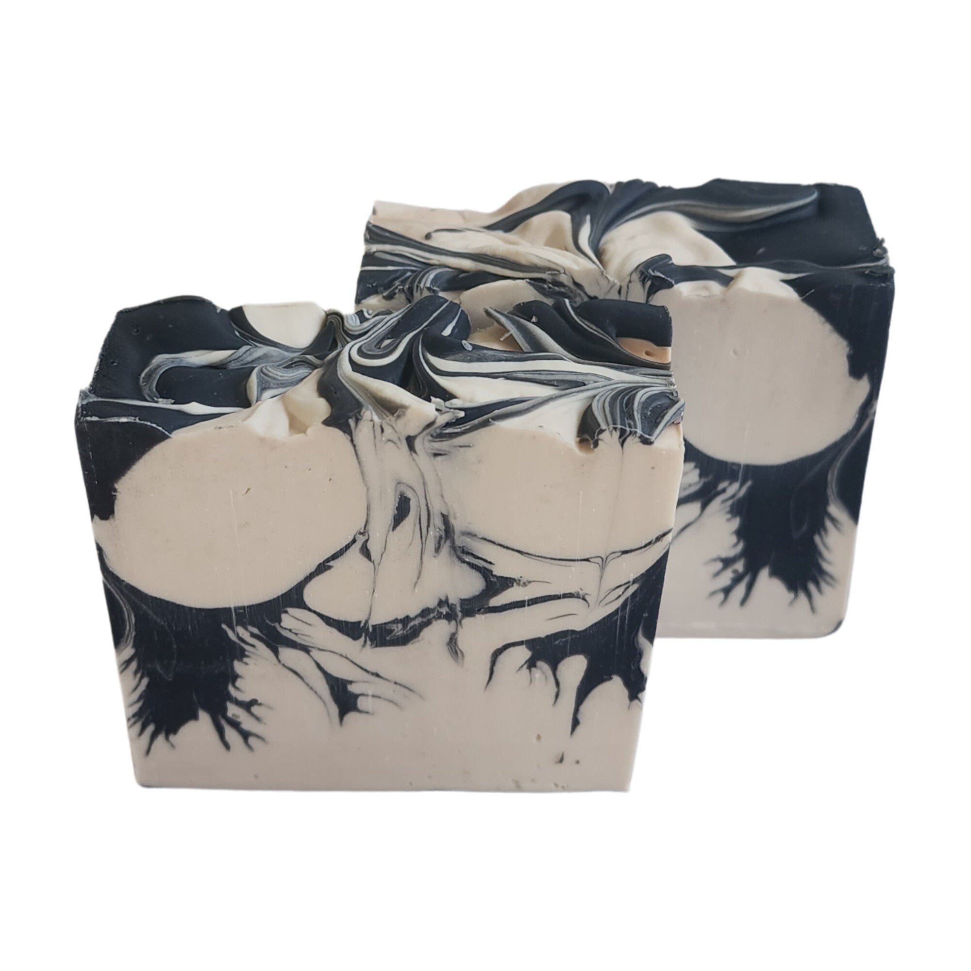 Palo Santo Cedar Soap bar with earthy and woodsy scents, handcrafted and wrapped, showcasing its unique design.