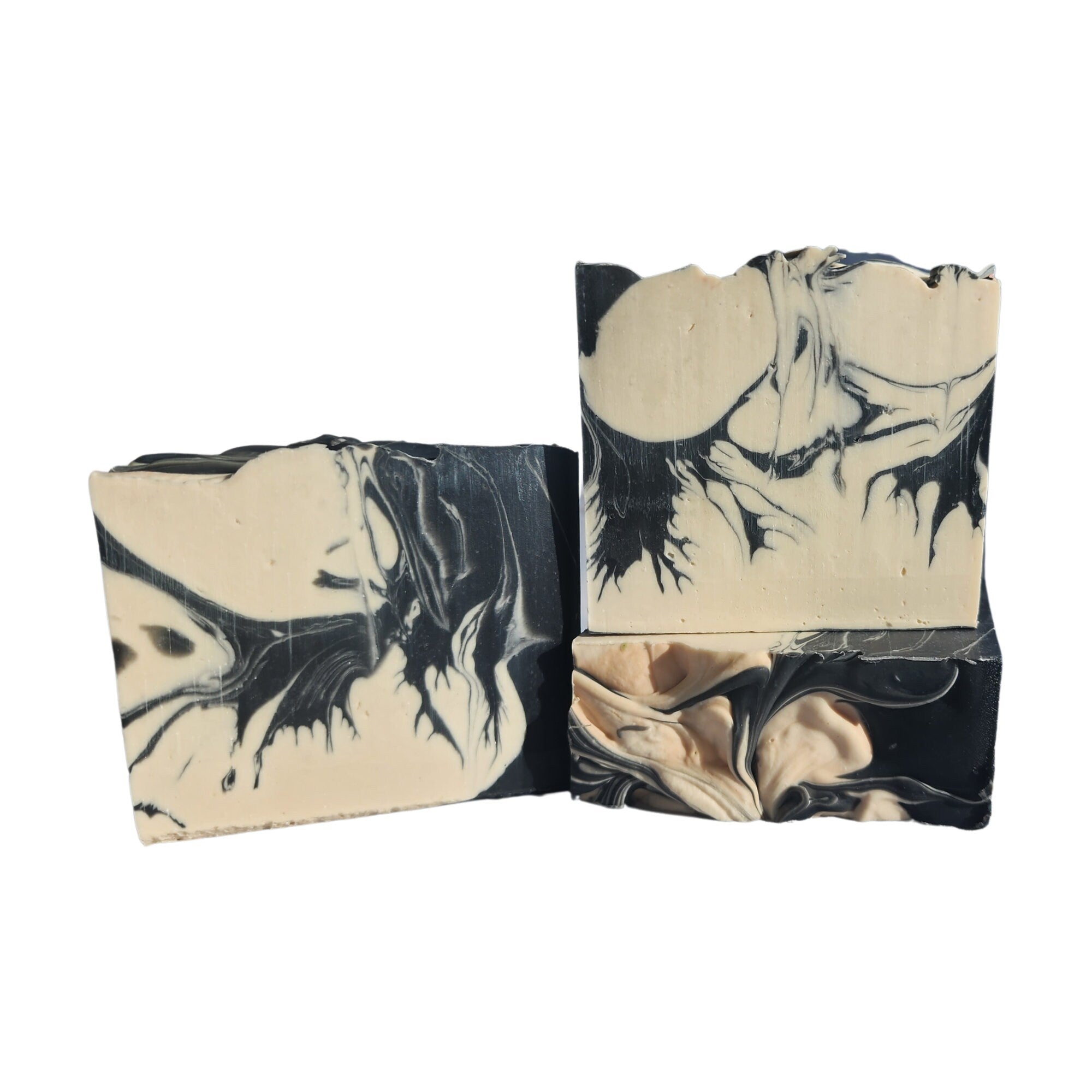 Palo Santo Cedar Soap bar with earthy and woodsy scents, handcrafted and wrapped, showcasing its unique design.