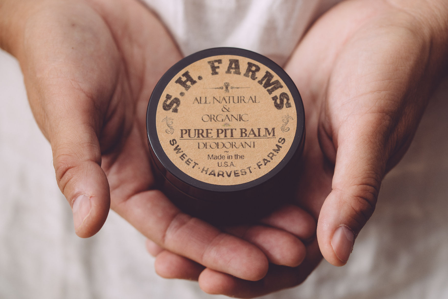 Pure Pit Balm - Organic and Natural Deodorant in a 4-ounce container, showcasing its eco-friendly packaging and natural ingredients.