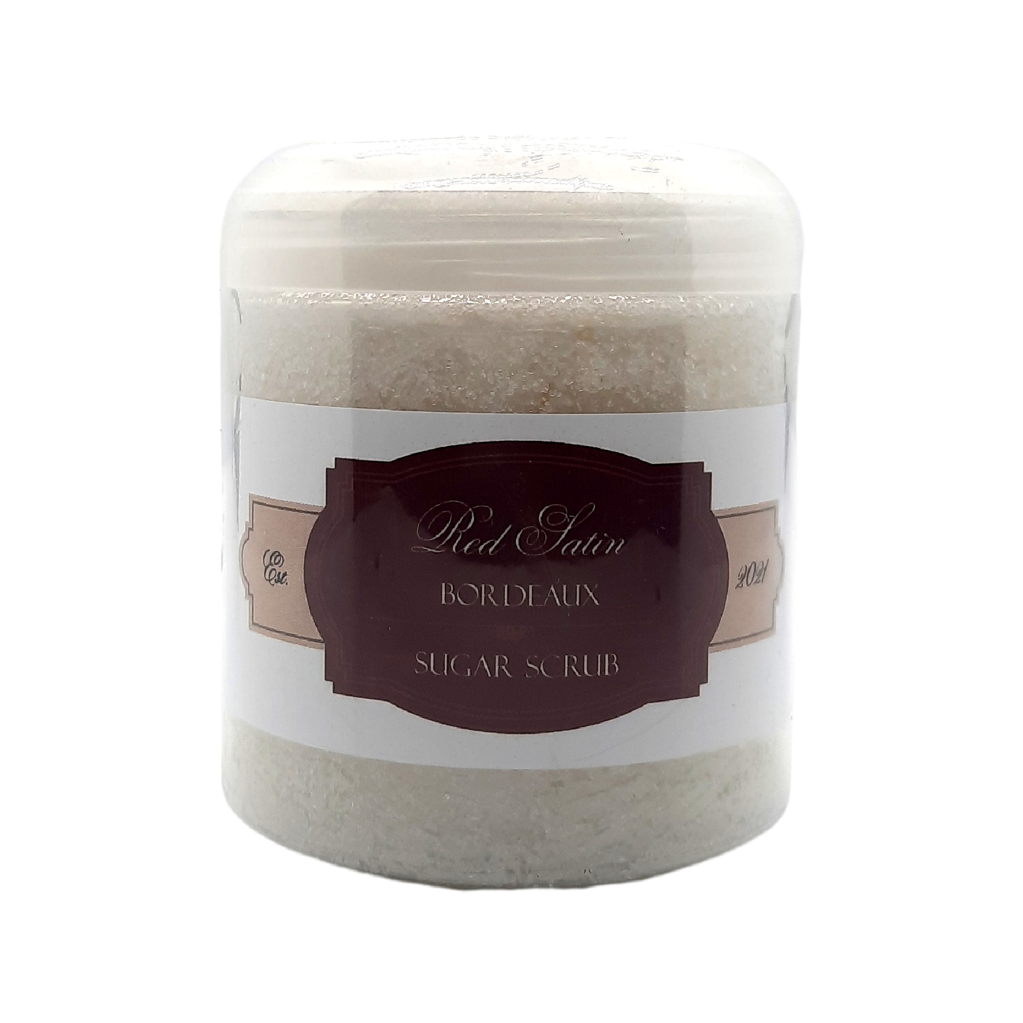 A jar of Red Satin Bordeaux Sugar Scrub with a rich, luxurious texture, surrounded by black cherries and vineyard grapes.