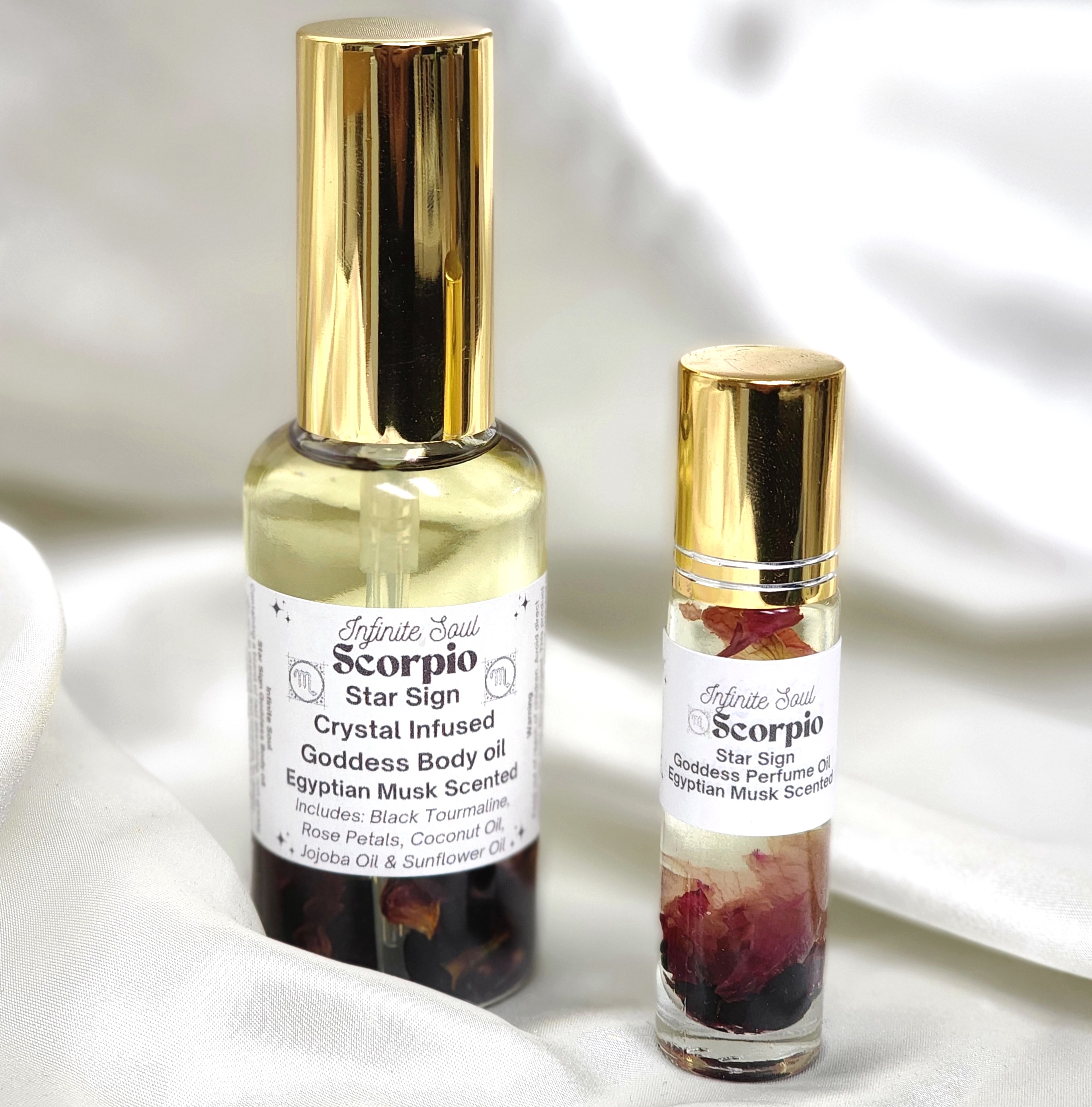 Scorpio Star Sign Crystal Infused Goddess Body Oil with Black Tourmaline crystals and Egyptian Musk scent, elegantly packaged.