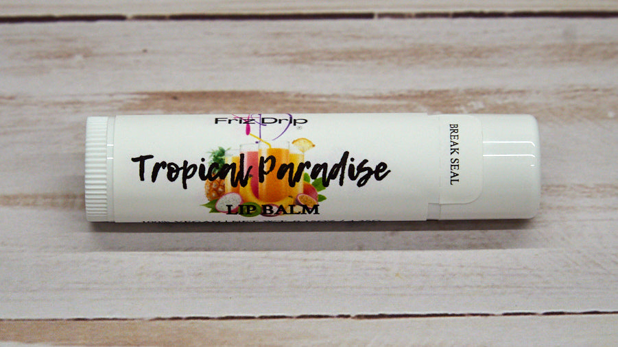 Tropical Paradise Lip Balm with tropical fruit scent, featuring a colorful packaging design and a smooth texture.