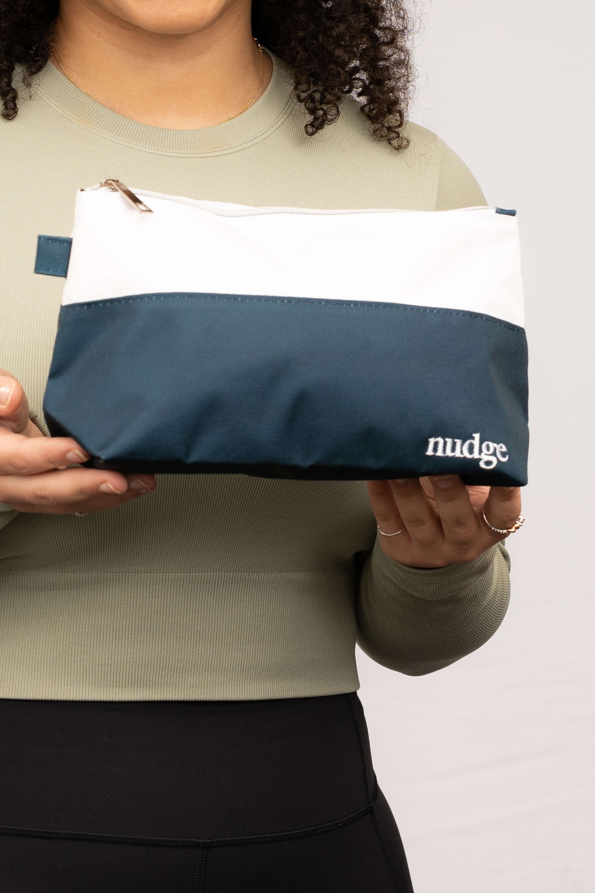 A stylish and durable washable travel pouch designed for oral care products, featuring a compact and lightweight design suitable for travel.