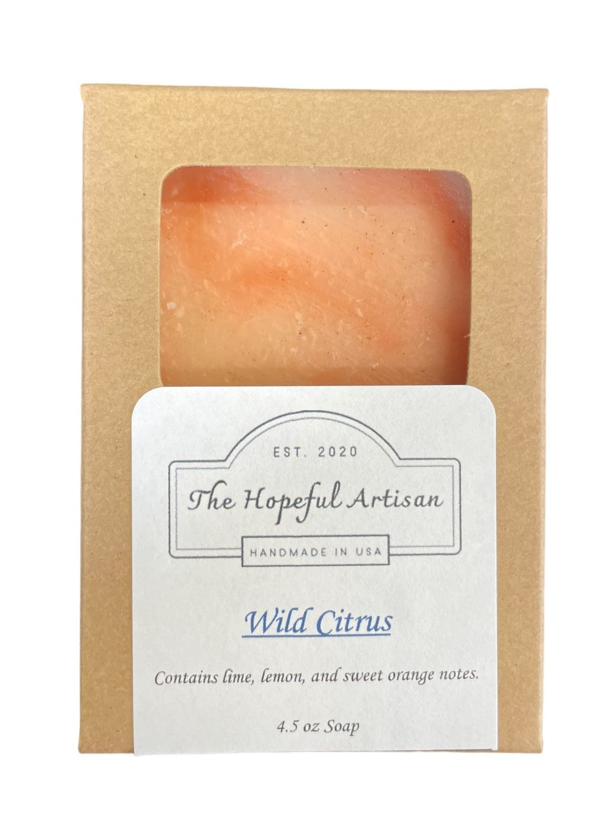 A vibrant bottle of Wild Citrus skincare product featuring lime, lemon, and sweet orange ingredients.