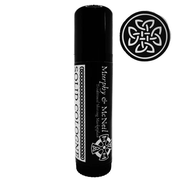 Banzai! Solid Cologne by Murphy and McNeil in a compact container, showcasing its vibrant citrus scent.