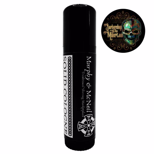 Barbershop De Los Muertos Solid Cologne by Murphy and McNeil in a stylish container, showcasing its unique design and branding.