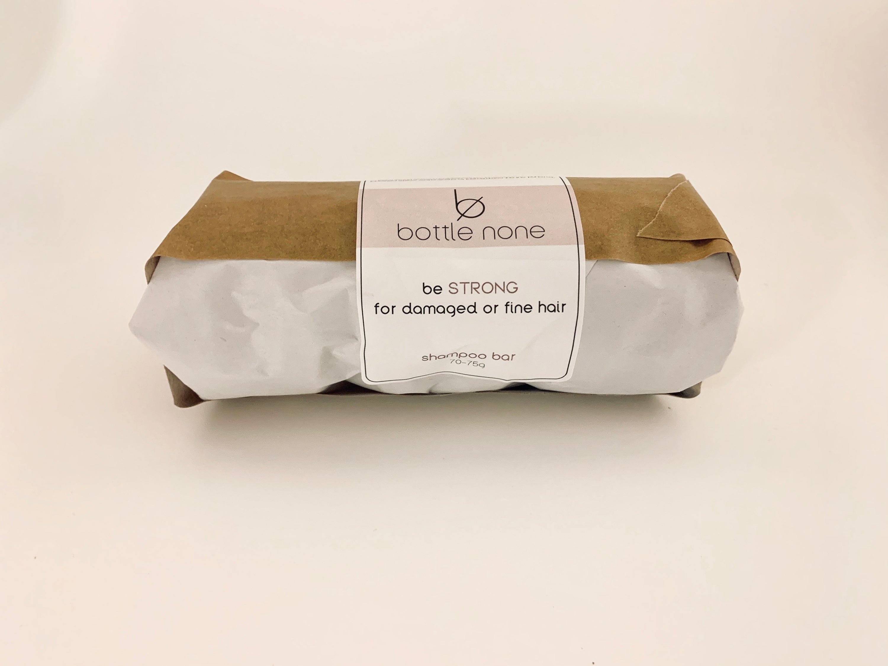 be STRONG Shampoo Bar CASE containing 6 bars, designed for fine or damaged hair, featuring natural ingredients like nettle and avocado oil.