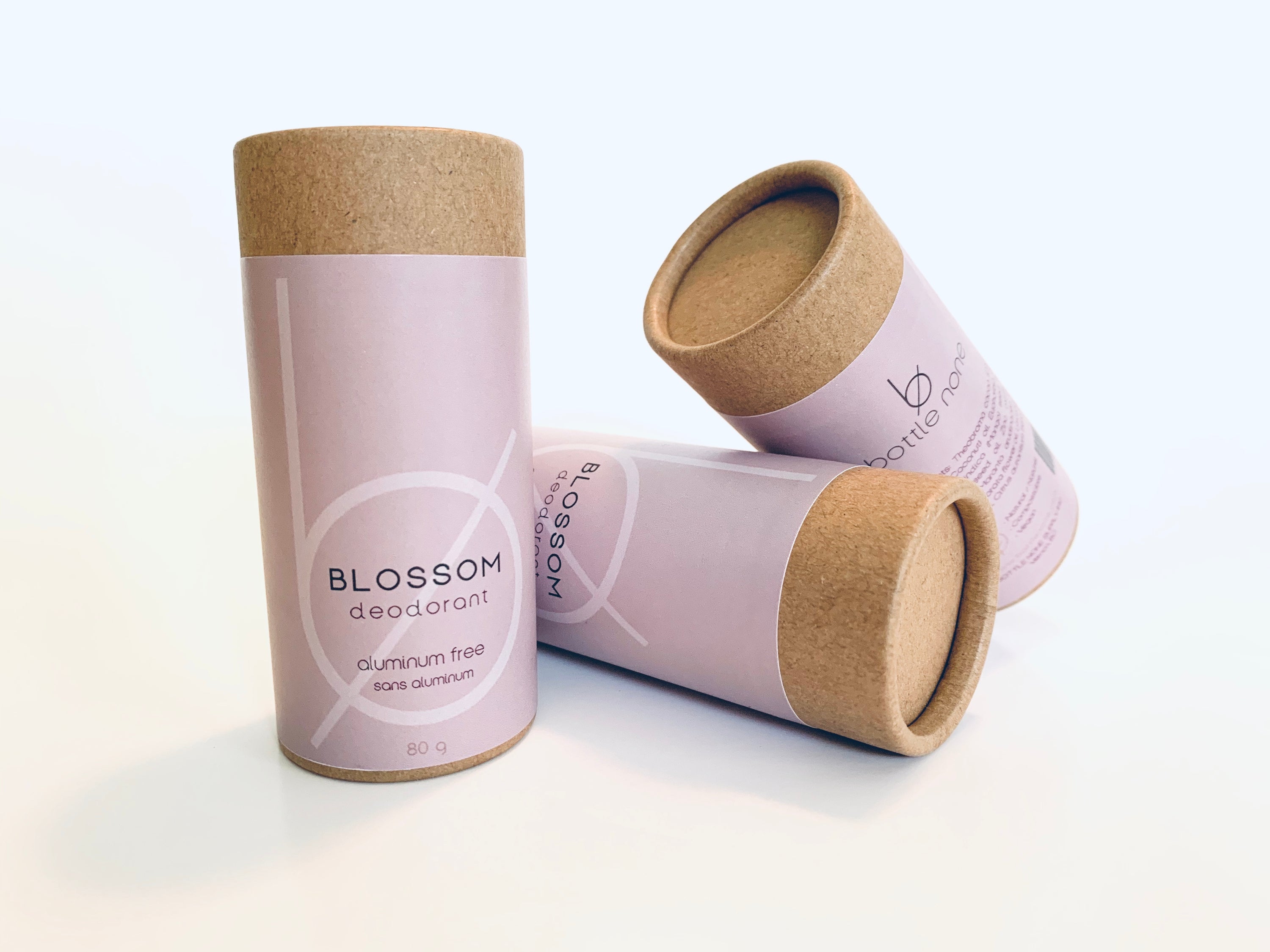 BLOSSOM Deodorant stick with floral design, showcasing its natural ingredients and baking soda-free formula.