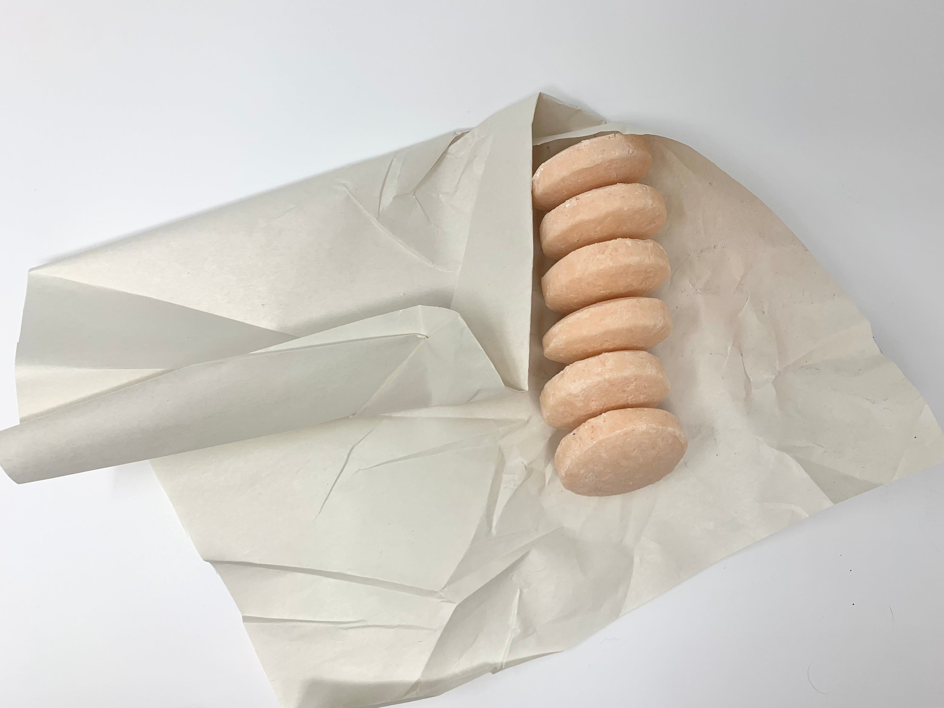 A pack of six CLARIFY detoxifying shampoo bars with a bright citrus scent, designed to remove buildup and residue from hair and scalp.