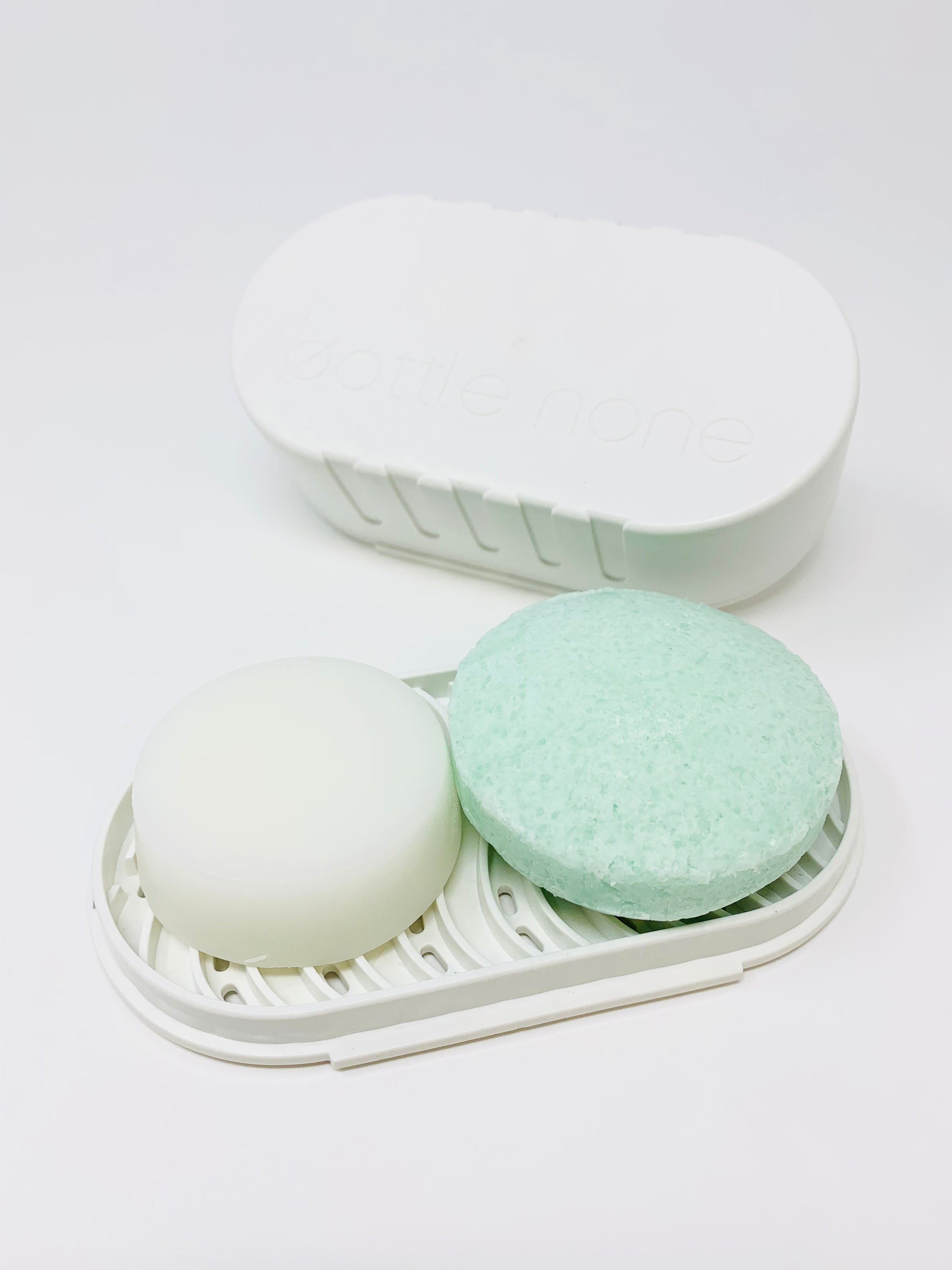 DEEP CLEAN be CLEAR Travel/Soap Dish Set featuring shampoo and conditioner bars with eco-friendly travel case.