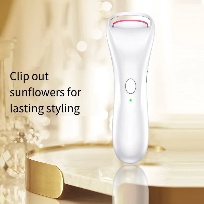 Electric eyelash curler with USB charging, featuring color-changing silicone cushions and a sleek design for perfect lash styling.