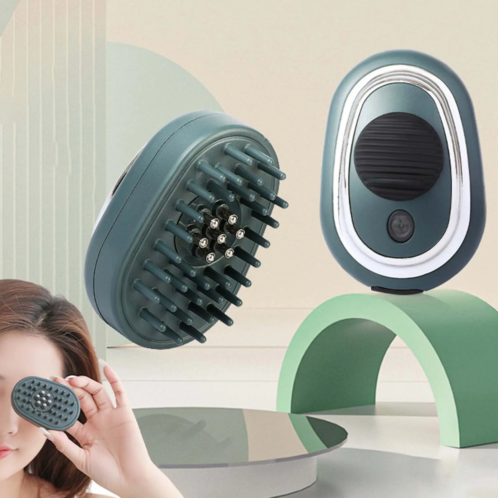 Electric Scalp Massager in a sleek design, showcasing its smooth comb heads and compact size, ideal for relaxation and essential oil application.
