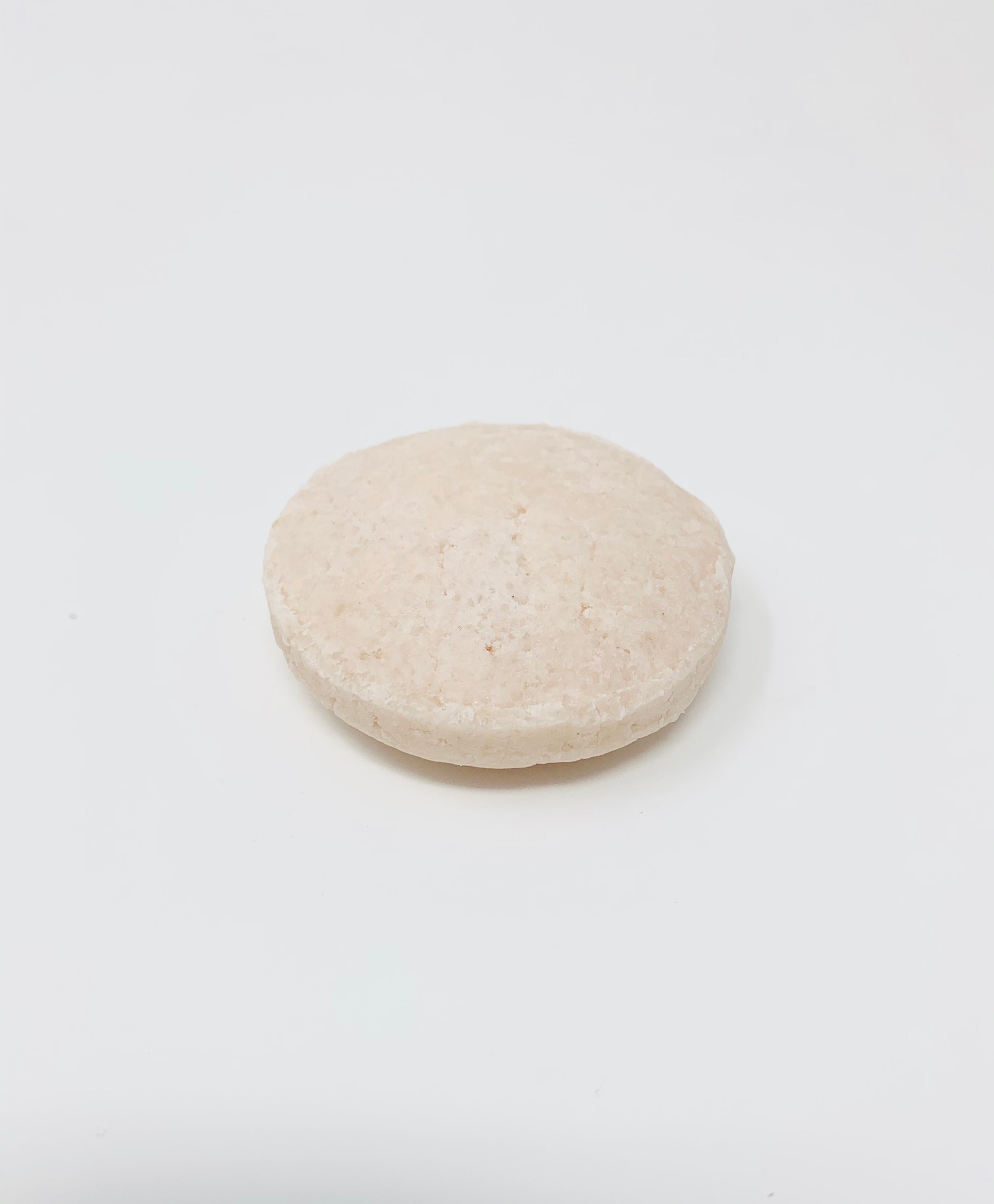 A close-up of a Face Wash Bar designed for normal to dry skin, showcasing its creamy texture and natural ingredients.