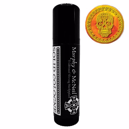 Gael Laoch Orange Solid Cologne by Murphy and McNeil, featuring vibrant packaging and a rich, aromatic scent.