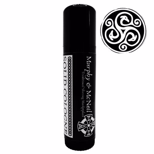 Mandate of Heaven Solid Cologne by Murphy and McNeil in a sleek container, showcasing its elegant design and rich fragrance.