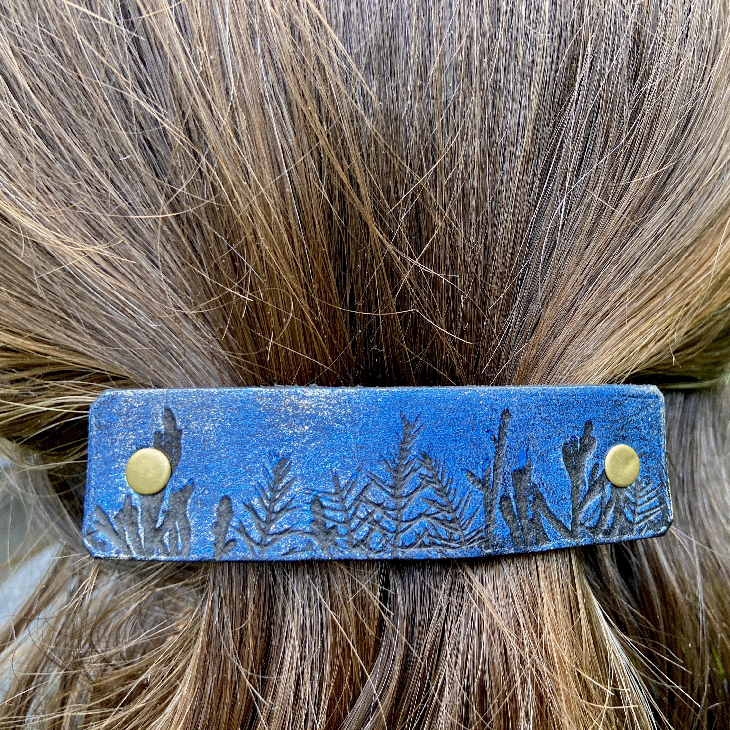 Moonlit Forest Trees Blue and Gold Barrette and Earring Gift Set featuring intricate leather designs inspired by nature.