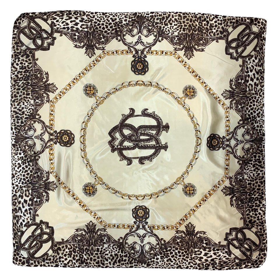 A luxurious multi-purpose satin scarf measuring 35" x 35", showcasing its soft texture and elegant design, perfect for fashion and hair styling.