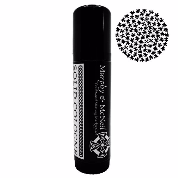 Naid Solid Cologne by Murphy and McNeil in a sleek container, showcasing its fresh freesia and apricot scent.