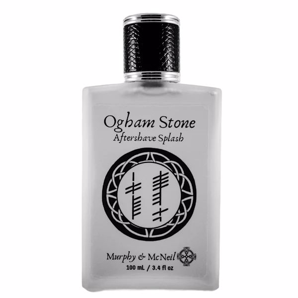 Ogham Stone Aftershave Splash by Murphy and McNeil, featuring a sleek bottle with a label inspired by ancient Irish writing.