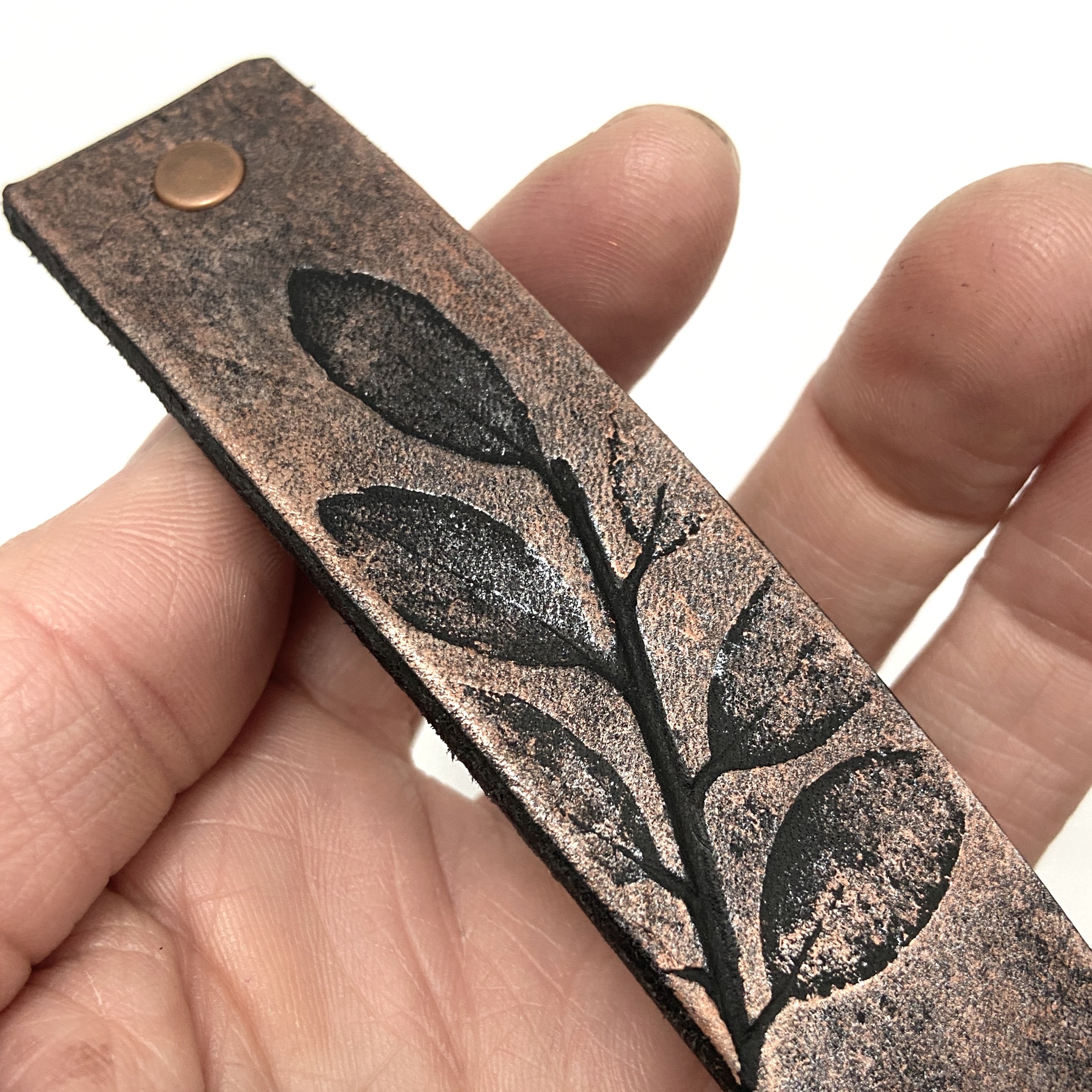 Rustic Copper Leaves Leather Hair Barrette featuring embossed leaves on leather with a sturdy metal clip.