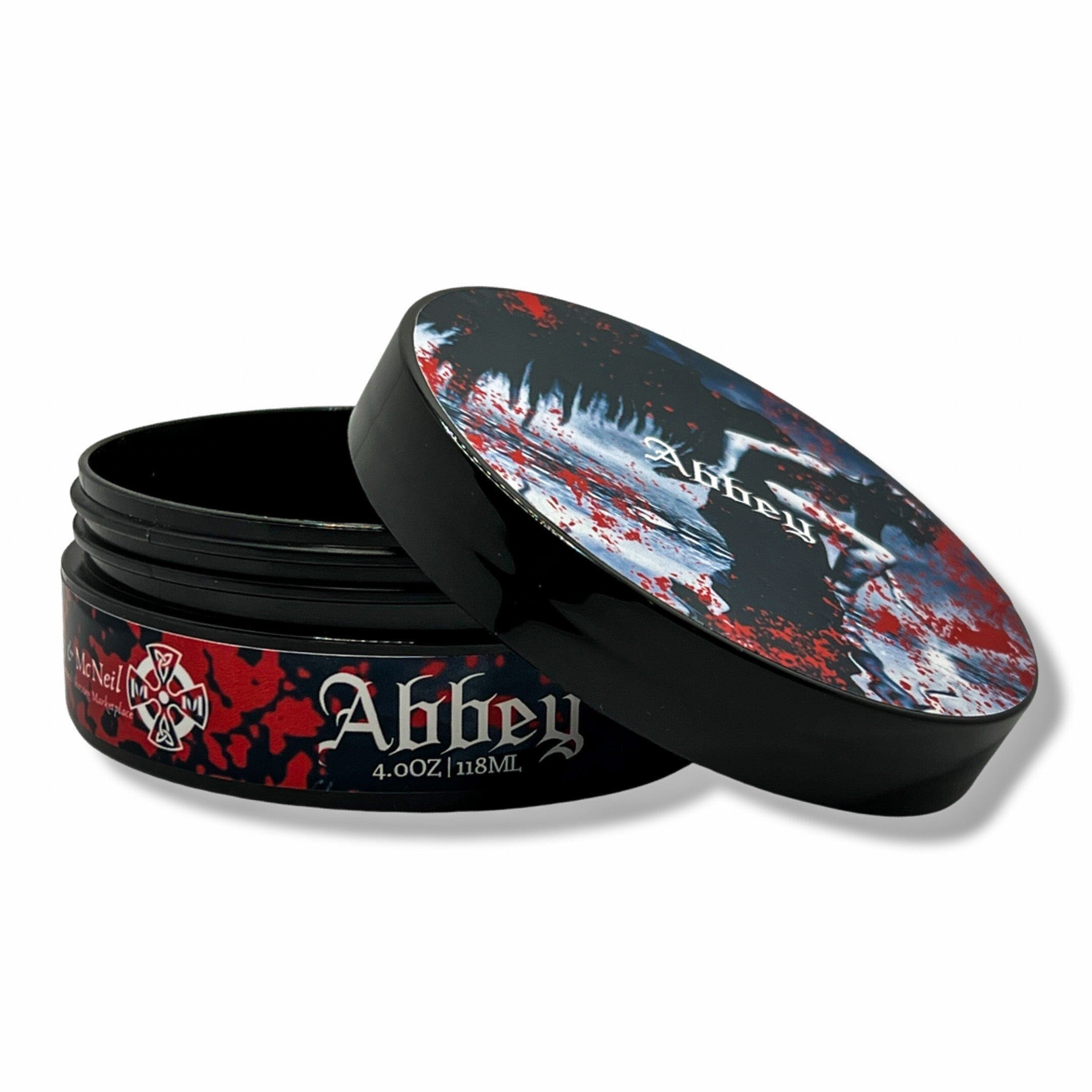 The Abbey Shaving Soap by Murphy and McNeil, featuring a rustic design and a creamy texture, embodying the essence of the Appalachian mountains.