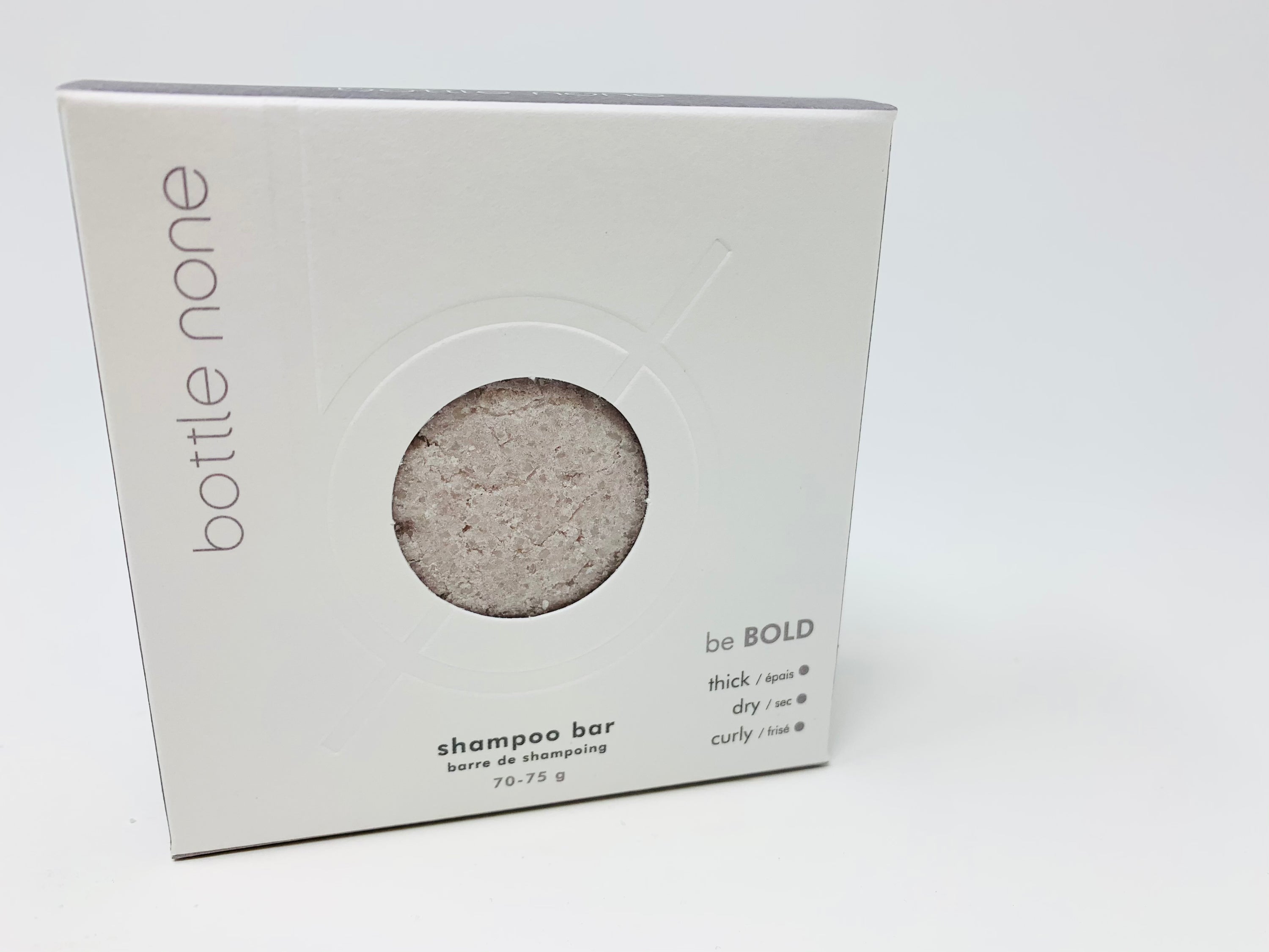 be BOLD Shampoo Bar for thick, dry, and curly hair, featuring natural ingredients in a boxed packaging.