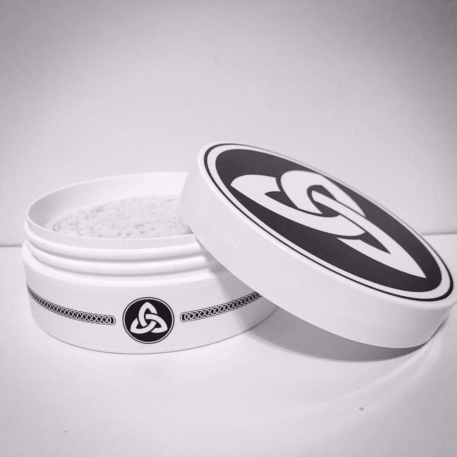 Trinity Shaving Soap (KODIAK FROST) by Murphy and McNeil in a 4.0 oz jar, showcasing its creamy texture and vibrant packaging.