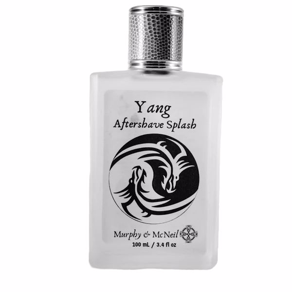 Yang Aftershave Splash by Murphy and McNeil in a sleek 100mL bottle, featuring a bright woody scent profile with Bamboo and Teakwood notes.