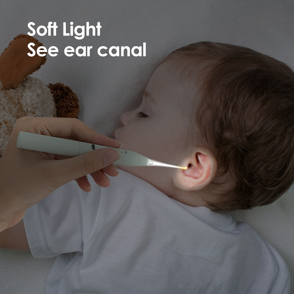 A green Baby Ear Cleaner Tool set with a flashlight, silicone spoon heads, and storage box, designed for safe earwax removal in infants.