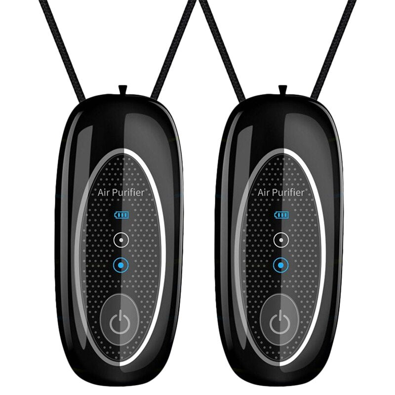 Two pieces of portable wearable air purifiers in black and white, designed for personal use, hanging from lanyards.