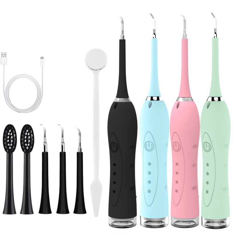 7 in 1 Sonic Electric Dental Calculus Scaler with USB charger and multiple replaceable heads for effective dental cleaning.