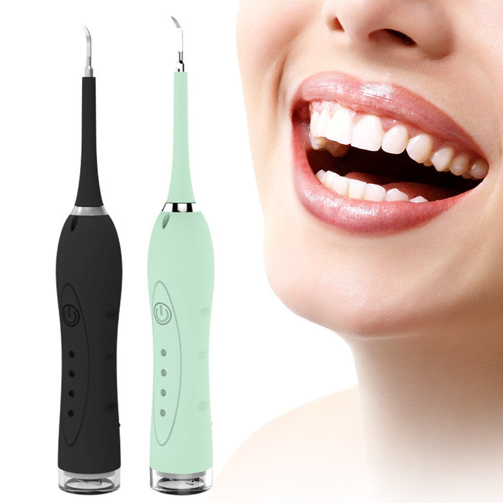 7 in 1 Sonic Electric Dental Calculus Scaler with USB charger and multiple replaceable heads for effective dental cleaning.