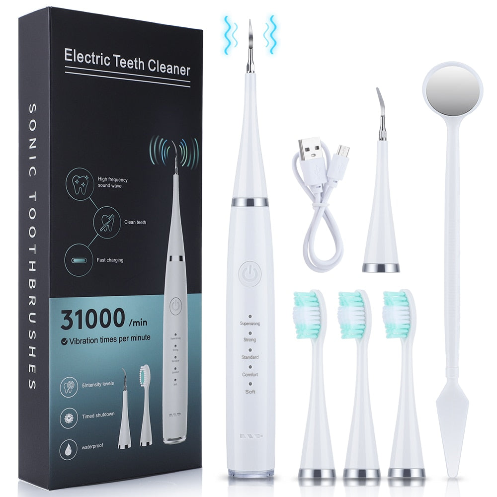 7pcs Sonic Dental Scaler Set with various cleaning heads and accessories for effective dental care.