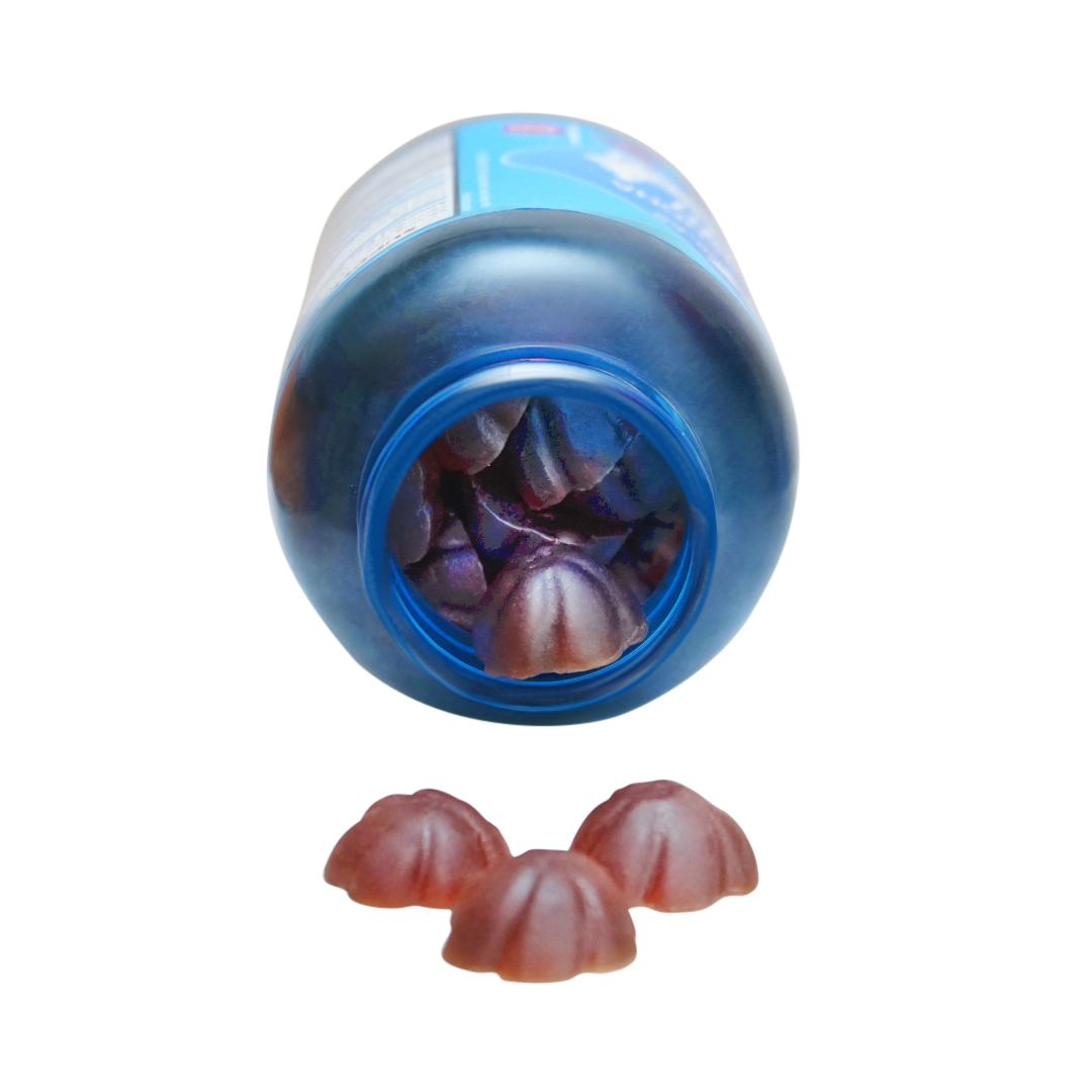 A bottle of Ashwagandha Gummies featuring 60 vegan gummies with a natural berry flavor, designed for stress relief and enhanced performance.