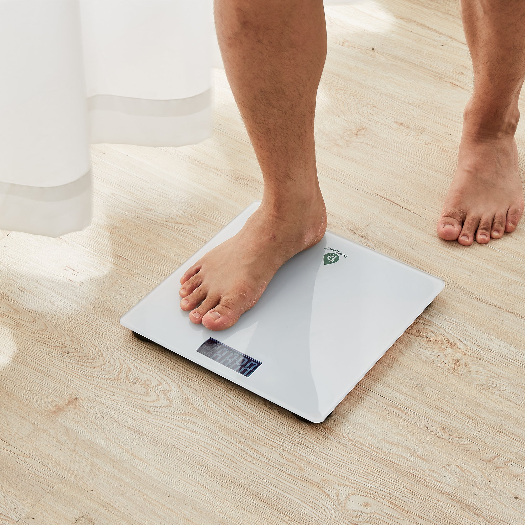 Pursonic Bathroom Digital Scale with a sleek tempered glass design and clear LCD display, perfect for weight monitoring.