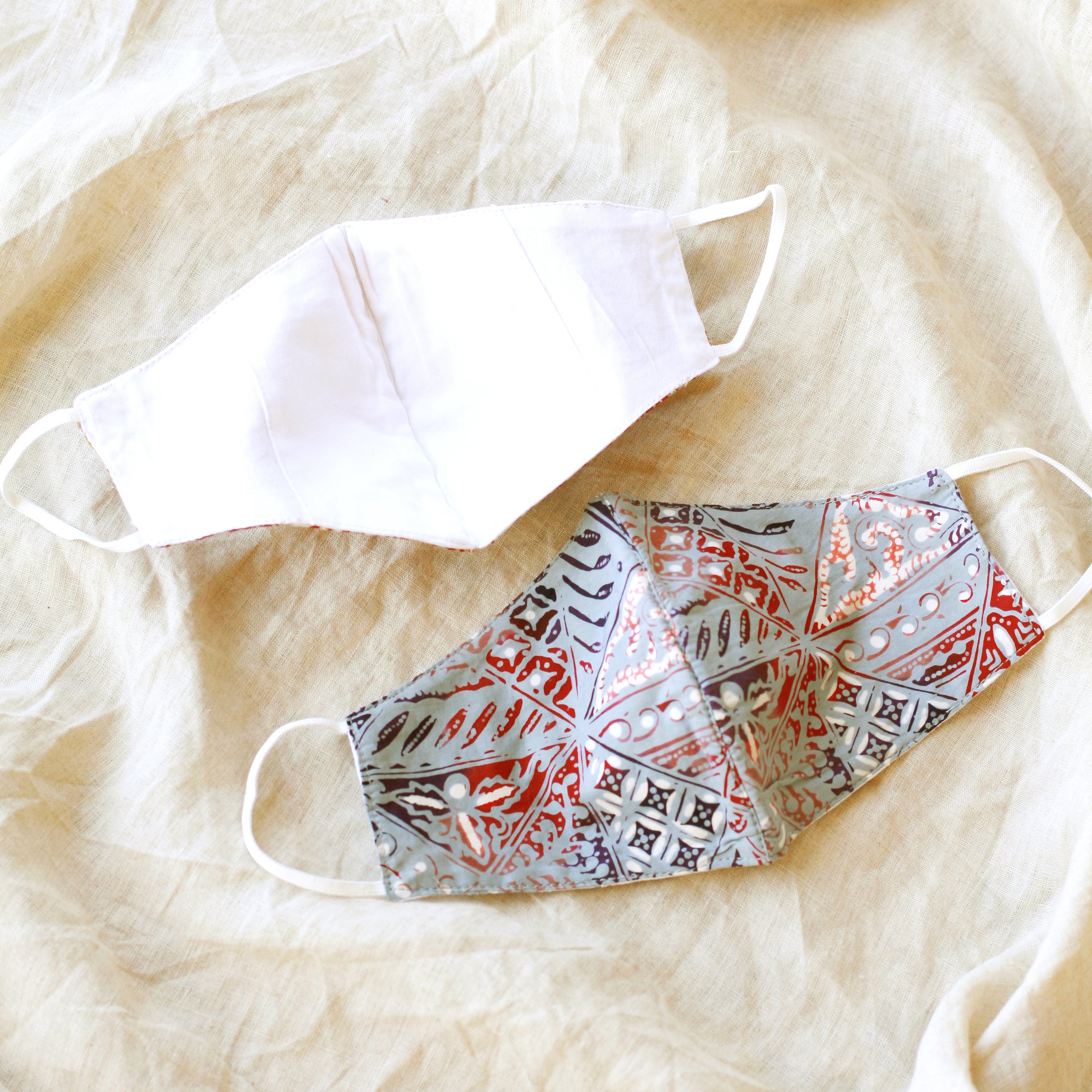 BLUE JAVA Triple Layer Vintage Batik Face Mask featuring intricate Batik patterns, waterproof filter, and elastic ear straps for a secure fit.