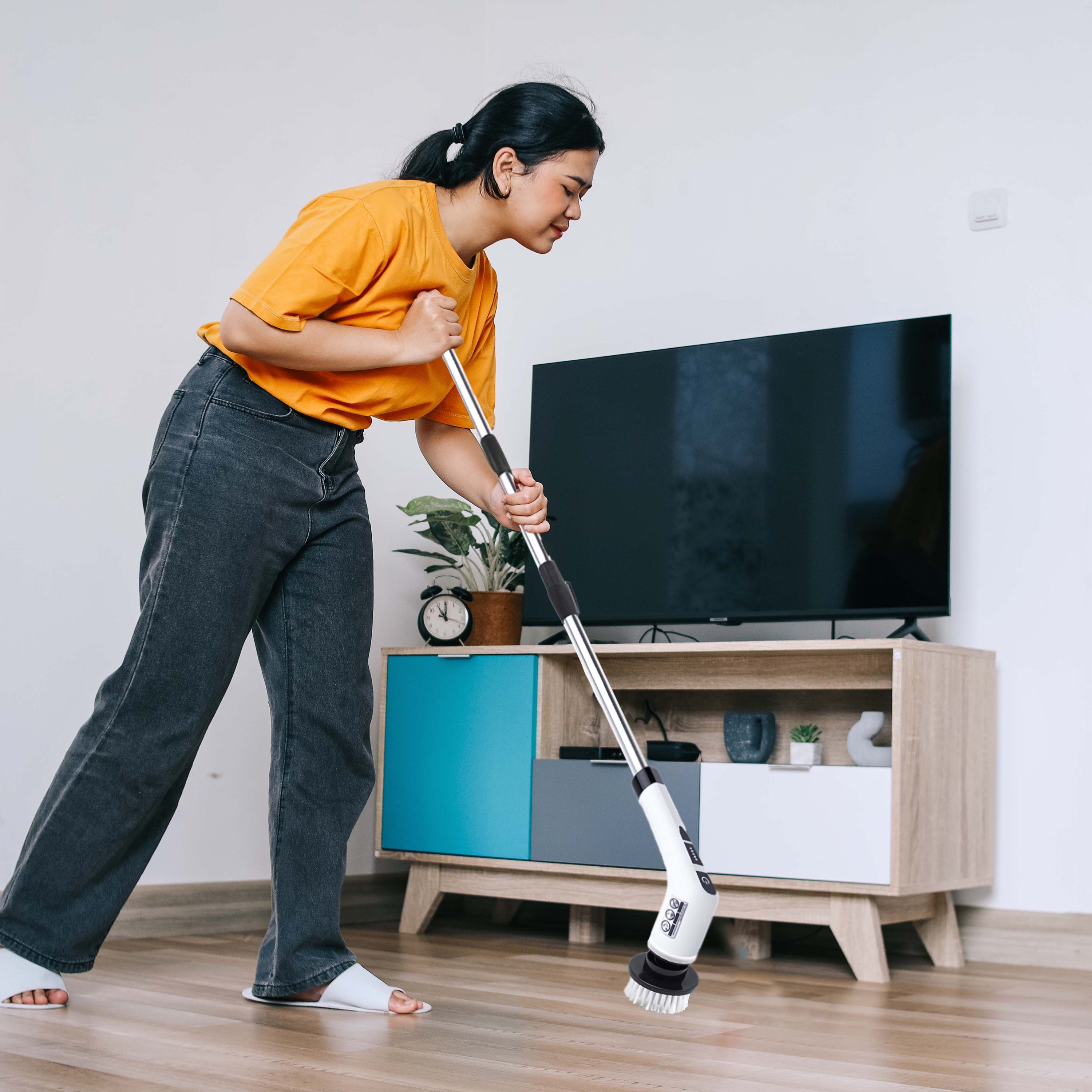 Cordless Rechargeable Power Scrubber Brush with adjustable handle and multiple cleaning heads for versatile cleaning tasks.
