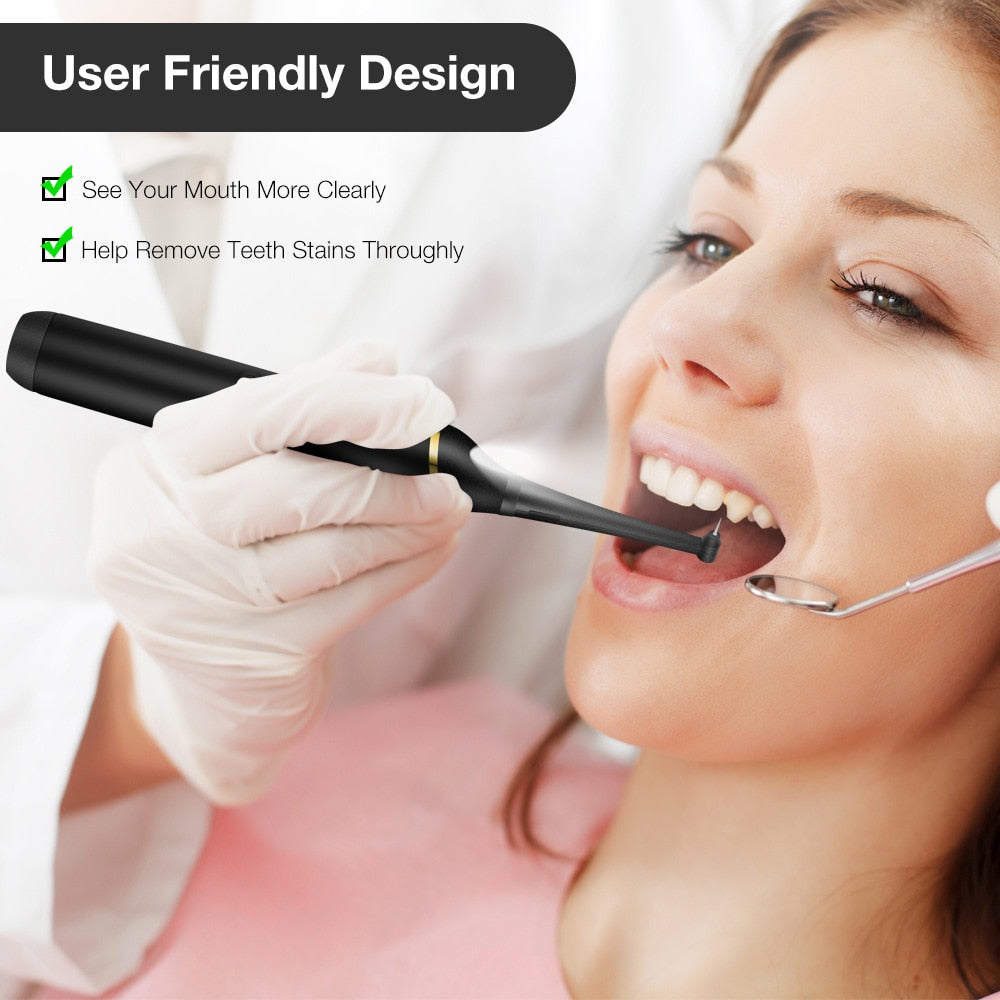 Electric Sonic Dental Scaler with LED light, featuring multiple cleaning heads and a sleek design for effective tooth cleaning.