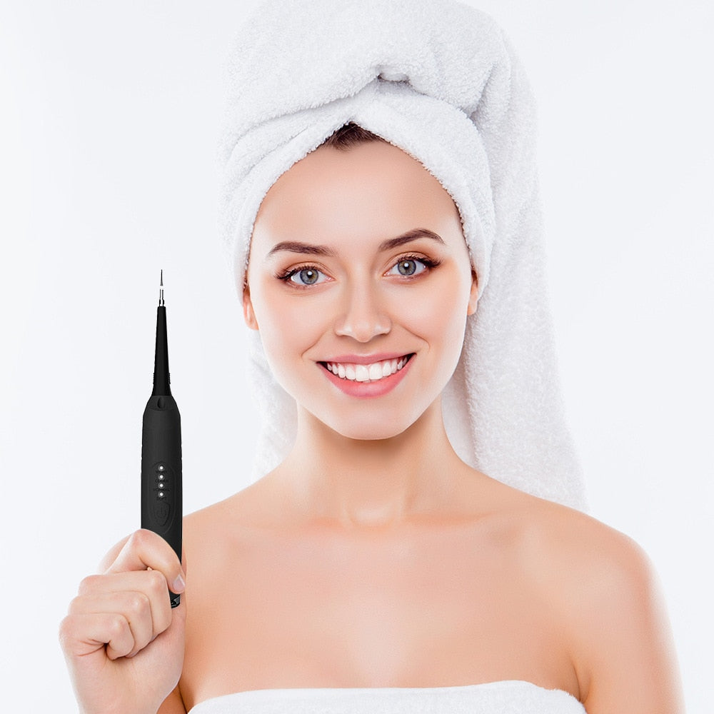 Electric Tooth Cleaner Sonic Dental Scaler with LED light, mouth mirror, and tongue scraper, designed for effective teeth whitening and plaque removal.