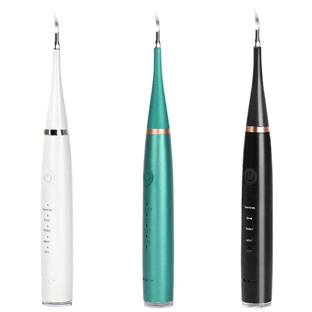 Electric toothbrush kit with three brush heads and accessories for teeth whitening and cleaning.