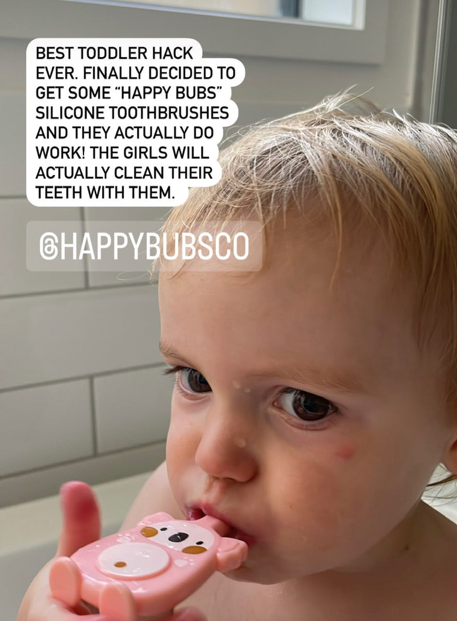 Happy Bubs U Shaped Silicone Toothbrush in pink, designed for toddlers aged 2-6 years, featuring a cute koala joey design.