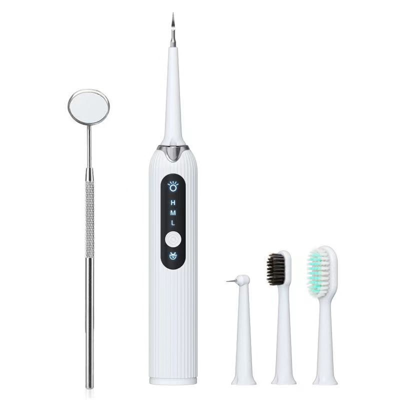 LED Sonic Electric Toothbrush with Dental Scaler, featuring multiple cleaning heads and USB charging capability, designed for effective teeth whitening.