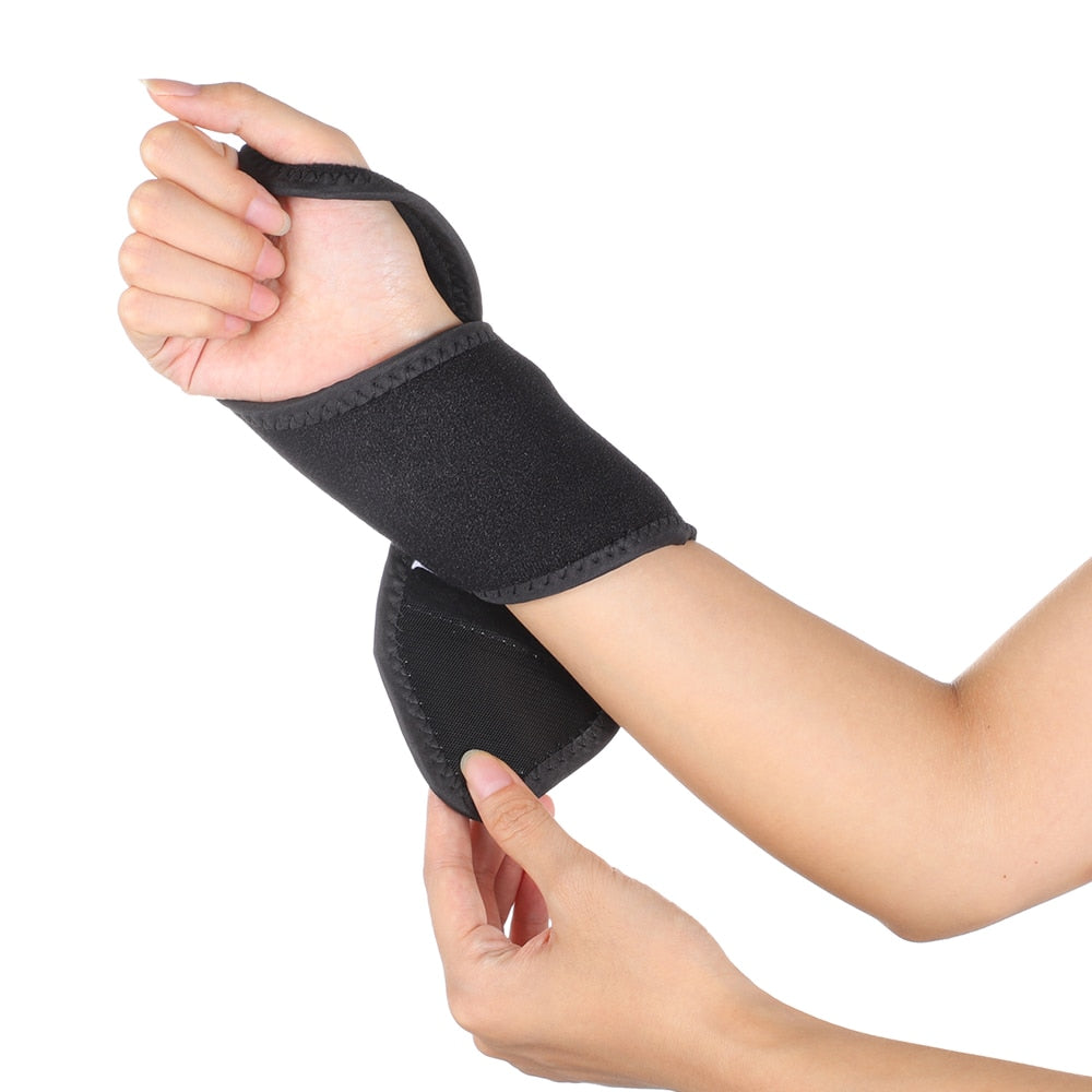Magnetic Therapy Self-Heating Wrist Support Brace Wrap in black, showcasing its adjustable design and USB power supply.